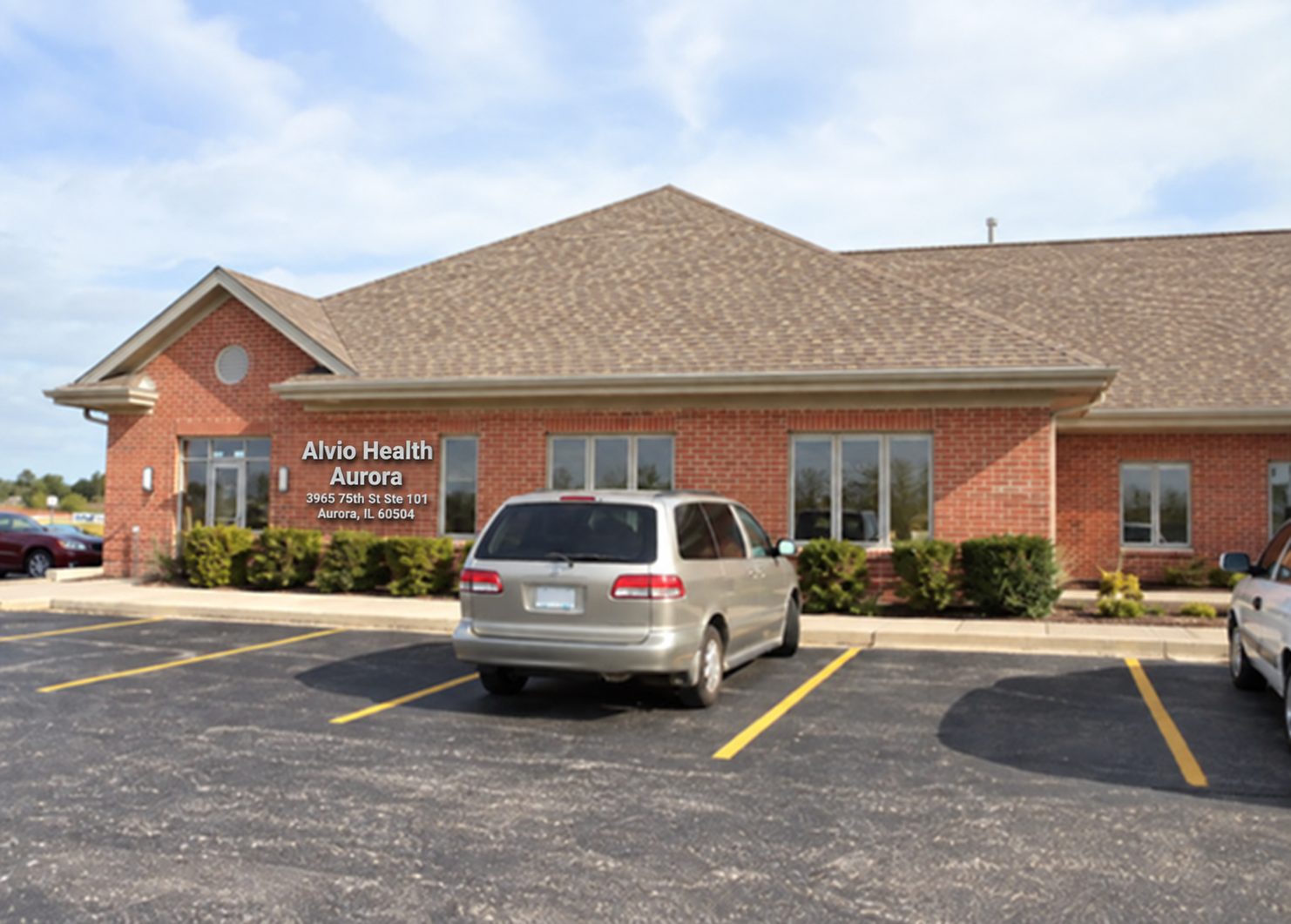 The Alvio Health Aurora building on 75th Street, seen from the parking lot