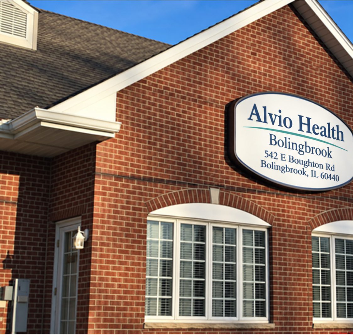 Close view of the Alvio Health Bolingbrook sign showing the street address